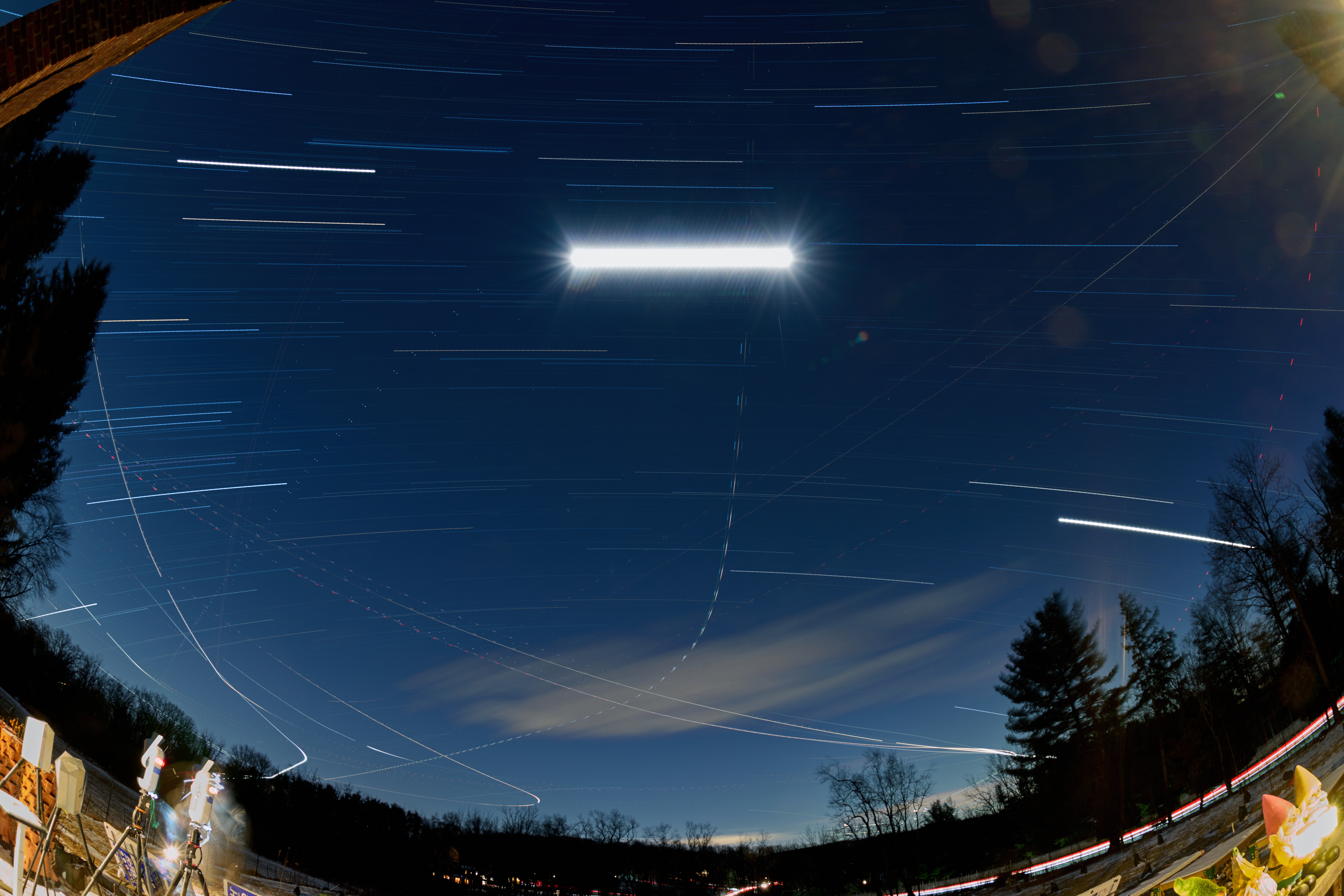 Winter Night Sky Star Trails Over New Jersey. Composite of images taken with a Nikon Z9 camera and 8-15 mm fisheye lens.