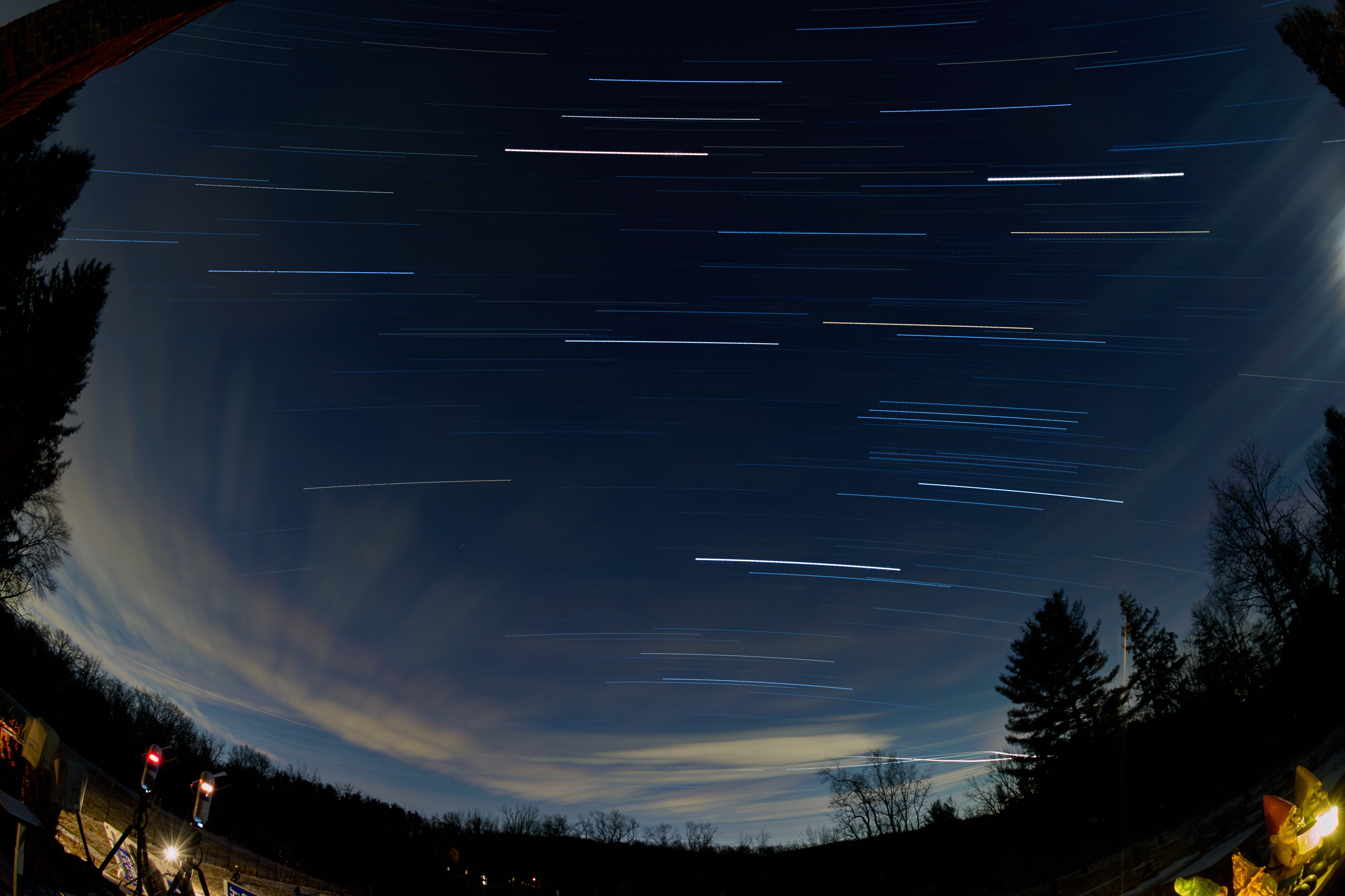 Winter Night Sky Star Trails Over New Jersey. Composite of images taken with a Nikon Z9 camera and 8-15 mm fisheye lens.